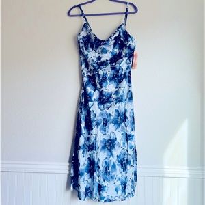 NWT! Flower pattern satin dress w/ a slit and adjustable straps. Sz: S